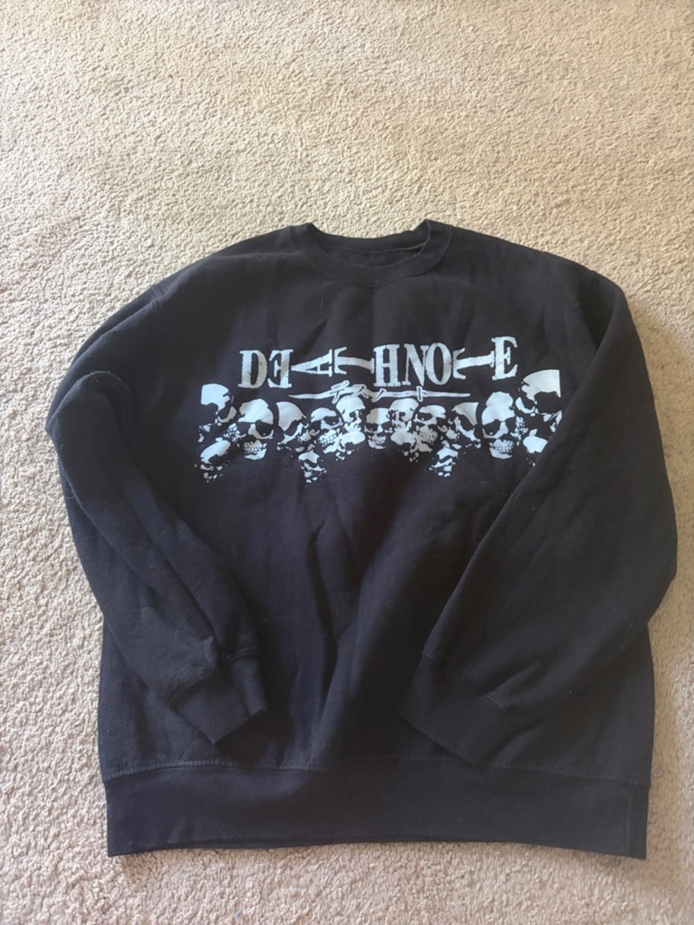 Black Crewneck Sweatshirt with Light Blue Skull Graphic